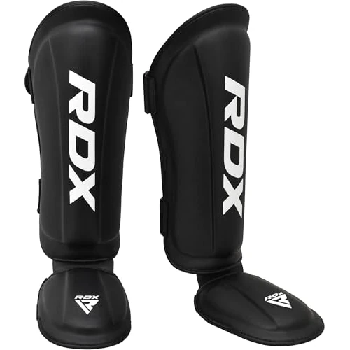 Offerta a tempo: RDX Paratibia Kick Boxing Muay Thai, Approvato da SMMAF, Maya Hide Pelle Protettivo Paratibie, Parastinchi Piedi Protezione Shin Guard per MMA Allenamento Sparring Arti Marziali Boxe Karatè BJJ, Uomo - 0.00% da 54.99 € a 54.99 €
