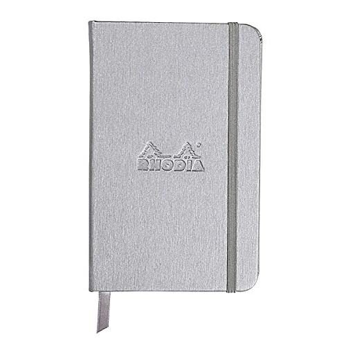 RHODIA 118067C - Taccuino rigido Webnotebook Argento - A6 - a righe - 192 pag. - Carta Clairefontaine Avorio 90g/m² - segnalibro, chiusura con elastico - COPERTINA Simil Cuoio
