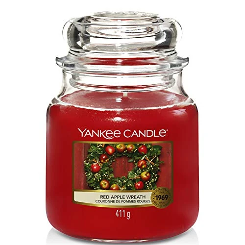 Offre limitee: Yankee Candle bougie jarre parfumée | moyenne taille | Couronne de pommes rouges | jusqu’à 75 heures de combustion de 29.90 EUR a 20.93 EUR (economie 30%)