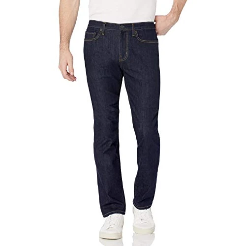 Amazon Essentials Jean Extensible Coupe Ajustée - Couleurs abandonnées Homme, Rincé, 32W / 34L