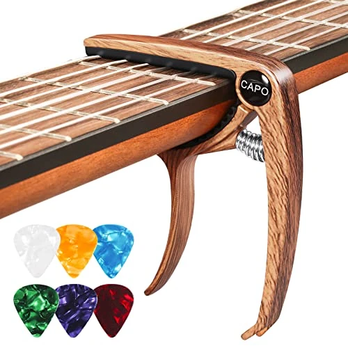 Oferta limitada: Cejilla Guitarra Española, Cejilla Guitarra Acustica con 6 Púas para Guitarra, Capo para Electrica Guitar Ukelele Profesional Capodastro Aleación Grano de Madera de 7.39 EUR a 6.99 EUR (ahorro 5%)