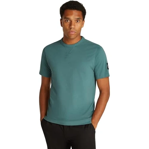 Limited-time offer: Calvin Klein Men’s Short Sleeve Regular T-Shirt with Logo Badge, Turquoise (North Atlantic), XS from 12.72 £ to 12.72 £ (save 0.00%)