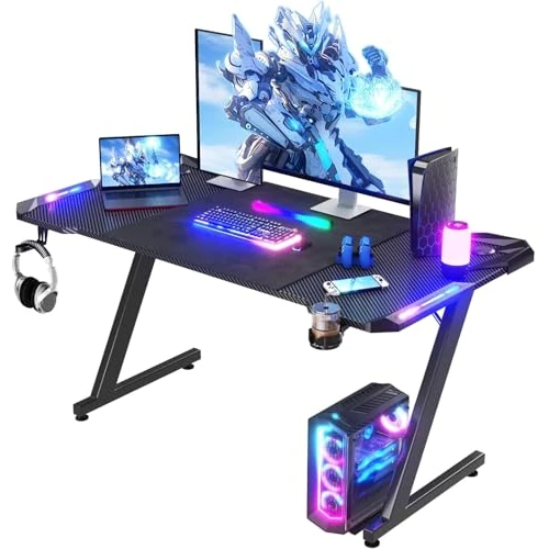Offerta a tempo: Homall Scrivania da gioco con luci LED, 140 x 60 cm, tavolo da gioco RGB, a forma di Z, grande scrivania per computer con gancio per cuffie, tavolo da gioco per casa e ufficio, nero - 0.00% da 68.99 € a 68.99 €