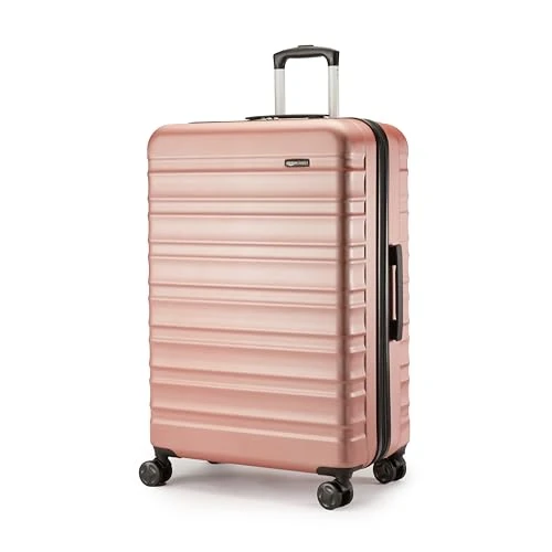 Limited-time offer: Amazon Basics Hard Shell Large Suitcase - Expandable ABS Travel Luggage with 4 Double Spinner Wheels - Scratch Resistant and Lightweight Construction - 78 x 52.6 x 32cm - Rose Gold from 69.90 £ to 59.90 £ (save 14%)