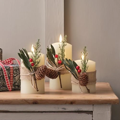 Lights4fun Set of 3 TruGlow® Battery Operated Flameless LED Pillar Candles Christmas Foliage Real Ivory Wax with Remote Control Indoor Use