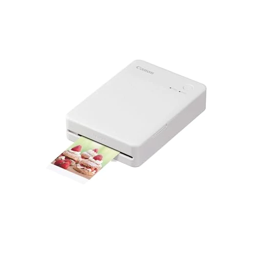 Begrenztes Angebot: Canon SELPHY QX20 mobiler Fotodrucker – per WLAN direkt vom Smartphone drucken. Thermosublimationsdruck, 2 Größen Stickerpapier und Laden per USB-C - Weiß (ohne Farband/Papier) von 128.57 EUR auf 99.00 EUR (Rabatt 23%)