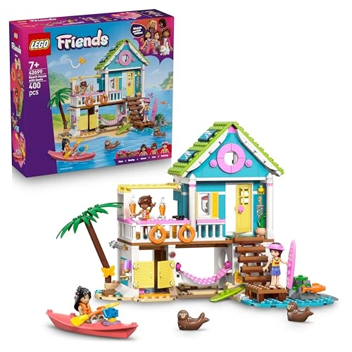 LEGO Friends Strandhaus mit Robben - Miniatur Spielset mit 3 Mini Puppen, 2 Meeres Tierfiguren und Zubehör inkl. Surfbrett & Kajak - Geburtstagsgeschenk für Mädchen ab 7 Jahren - 42699